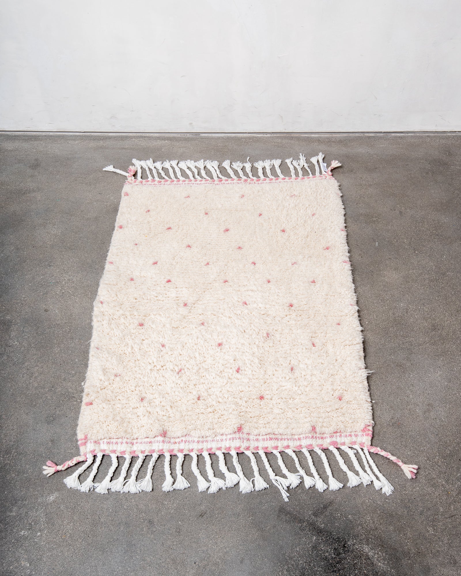 Modern, designer, handcrafted Berber rug from Morocco. Beniourain carpet with beautiful colours and patterns and fluffy wool texture.